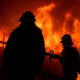 Firefighters try to put out the Getty Fire.